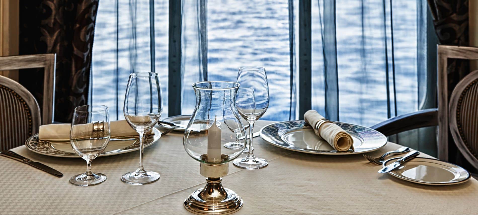 Dining table set in a waterside restaurant